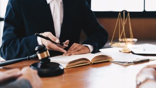 Business people and lawyer contract signing and explaining to customers at the office.